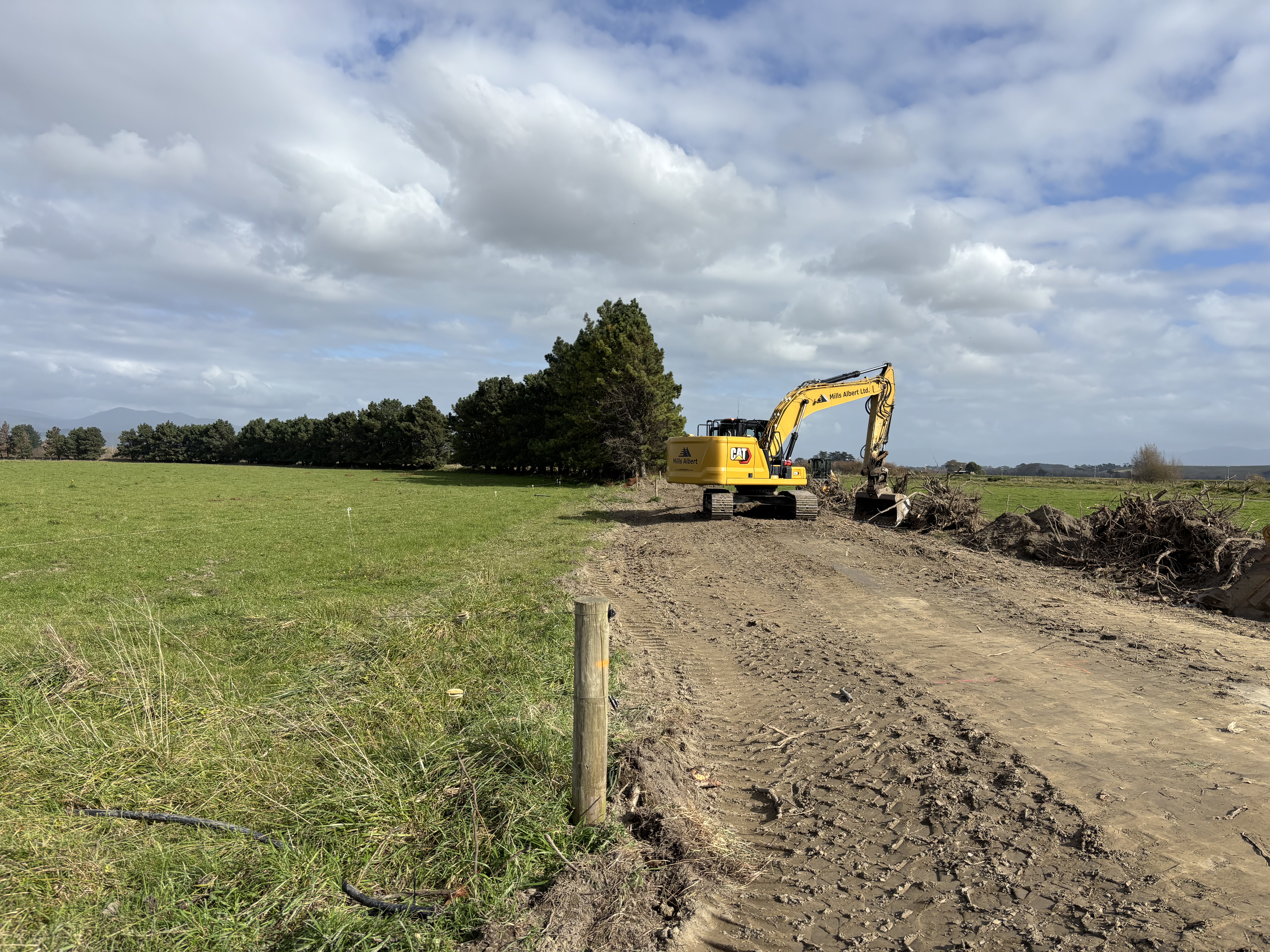 A digger working nearby the Ruamāhanga River