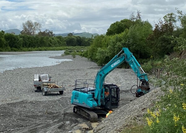 Digger on the bank of the Waingawa River