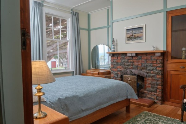 View of one of the queen bed bedrooms in the cottage